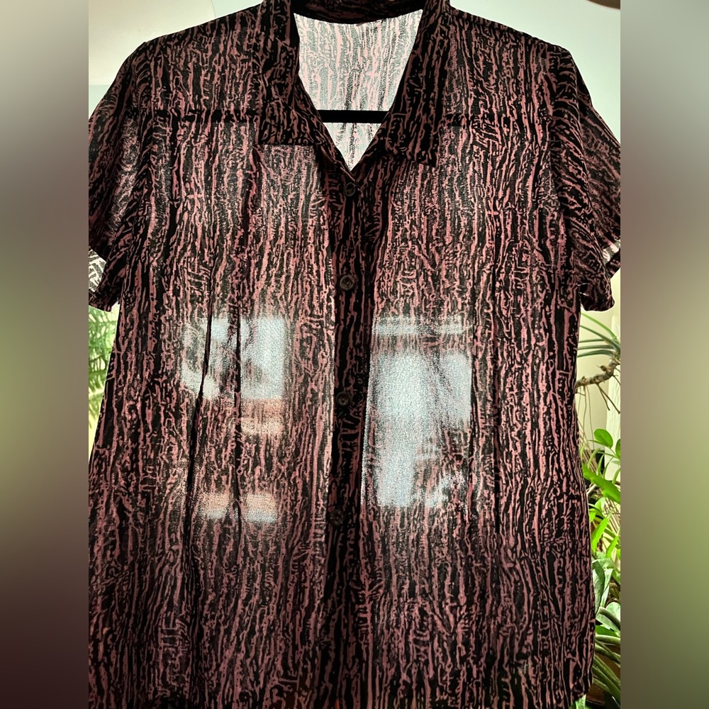 Sheer pink and navy pattered blouse